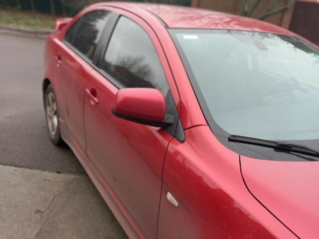 Червоний Міцубісі Lancer, об'ємом двигуна 2 л та пробігом 250 тис. км за 6500 $, фото 1 на Automoto.ua