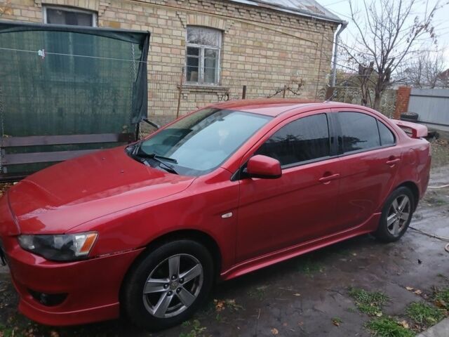 Червоний Міцубісі Lancer, об'ємом двигуна 2 л та пробігом 2 тис. км за 6200 $, фото 10 на Automoto.ua