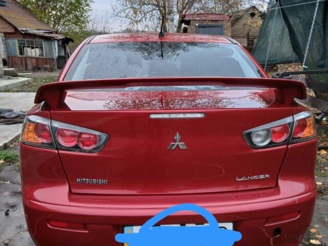 Червоний Міцубісі Lancer, об'ємом двигуна 2 л та пробігом 2 тис. км за 6200 $, фото 9 на Automoto.ua
