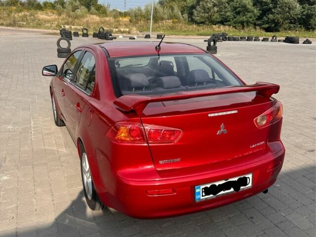 Мицубиси Лансер 2009 в Львове на Automoto.ua Красный Мицубиси Лансер, объемом двигателя 1.5 л и пробегом 202 тыс. км за 5800 $, фото 5 на Automoto.ua