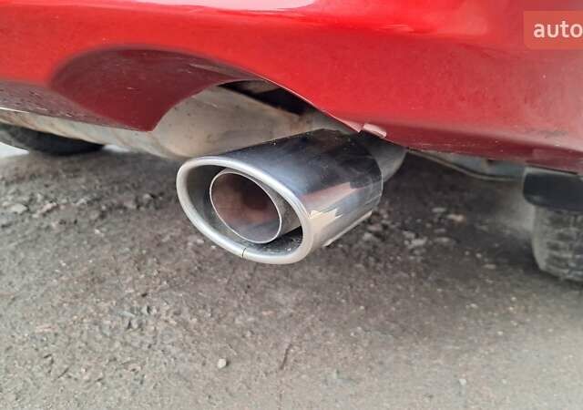 Красный Мицубиси Лансер, объемом двигателя 2 л и пробегом 120 тыс. км за 7800 $, фото 14 на Automoto.ua