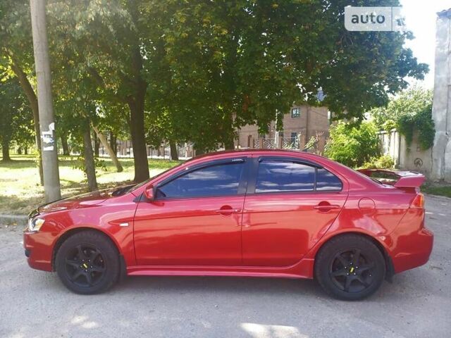 Червоний Міцубісі Lancer, об'ємом двигуна 2 л та пробігом 95 тис. км за 7200 $, фото 1 на Automoto.ua