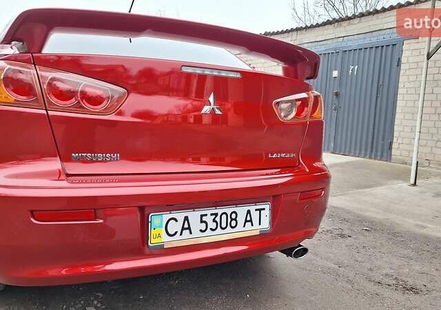 Красный Мицубиси Лансер, объемом двигателя 2 л и пробегом 120 тыс. км за 7800 $, фото 11 на Automoto.ua