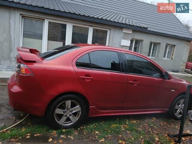 Червоний Міцубісі Lancer, об'ємом двигуна 2 л та пробігом 228 тис. км за 6200 $, фото 4 на Automoto.ua