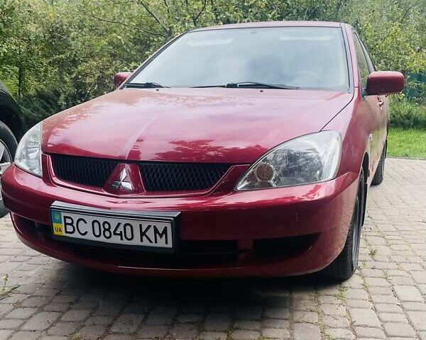 Червоний Міцубісі Lancer, об'ємом двигуна 1.58 л та пробігом 132 тис. км за 5300 $, фото 4 на Automoto.ua