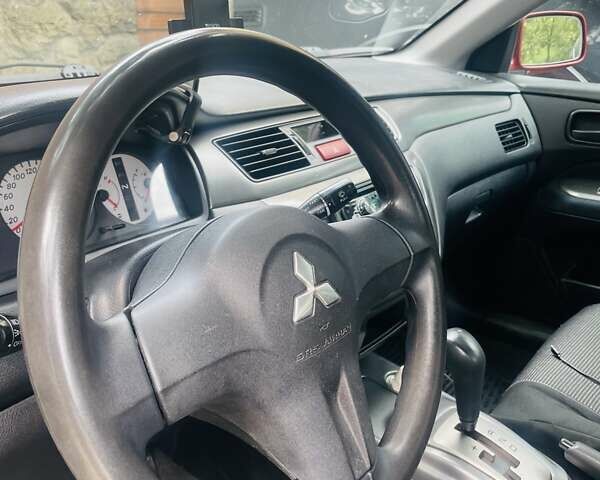Червоний Міцубісі Lancer, об'ємом двигуна 1.58 л та пробігом 132 тис. км за 5300 $, фото 3 на Automoto.ua