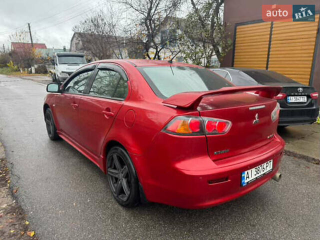 Красный Мицубиси Лансер, объемом двигателя 2 л и пробегом 246 тыс. км за 4900 $, фото 2 на Automoto.ua