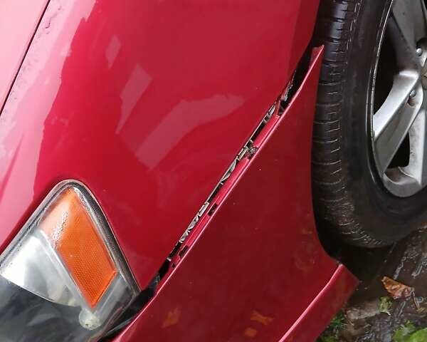 Червоний Міцубісі Lancer, об'ємом двигуна 2 л та пробігом 228 тис. км за 6200 $, фото 2 на Automoto.ua