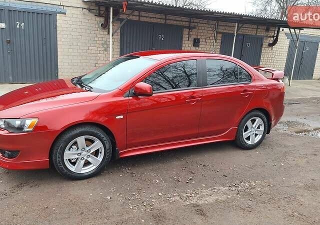 Красный Мицубиси Лансер, объемом двигателя 2 л и пробегом 120 тыс. км за 7800 $, фото 22 на Automoto.ua