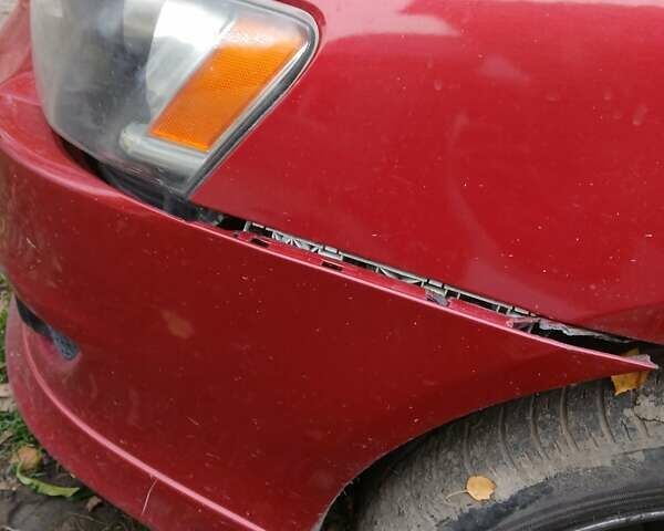 Червоний Міцубісі Lancer, об'ємом двигуна 2 л та пробігом 228 тис. км за 6200 $, фото 10 на Automoto.ua