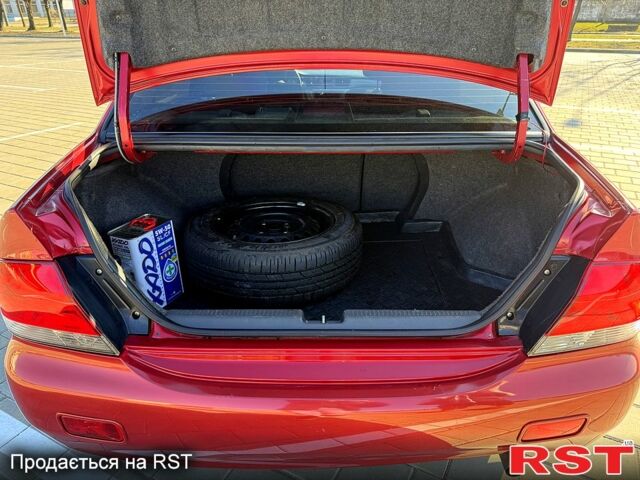 Червоний Міцубісі Lancer, об'ємом двигуна 1.6 л та пробігом 143 тис. км за 7000 $, фото 4 на Automoto.ua