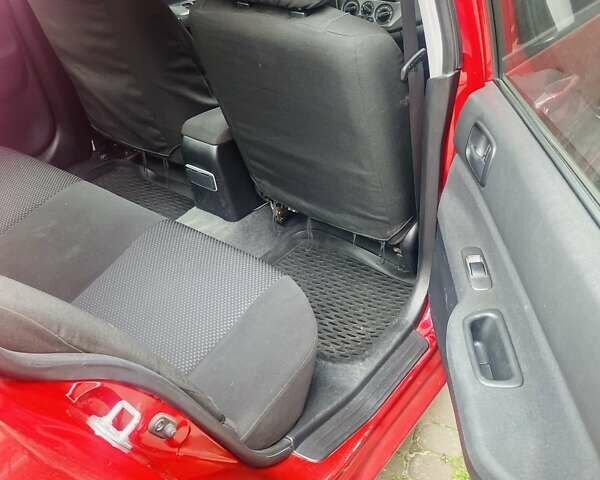 Червоний Міцубісі Lancer, об'ємом двигуна 1.58 л та пробігом 132 тис. км за 5300 $, фото 7 на Automoto.ua