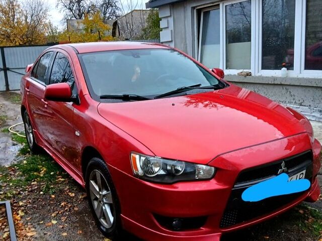 Червоний Міцубісі Lancer, об'ємом двигуна 2 л та пробігом 228 тис. км за 6500 $, фото 5 на Automoto.ua