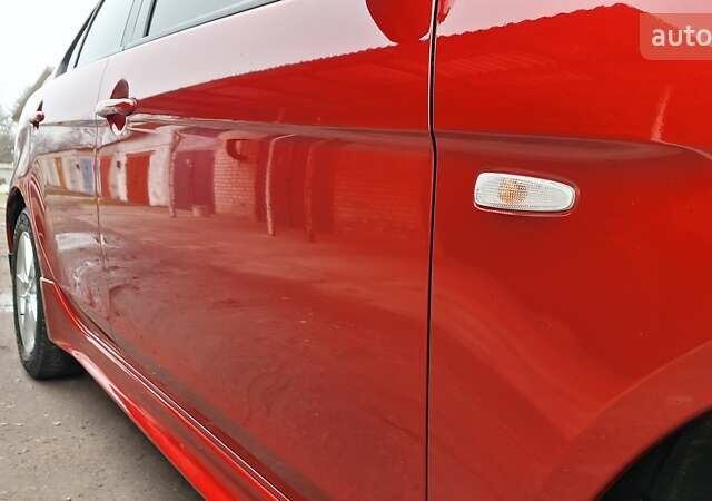 Красный Мицубиси Лансер, объемом двигателя 2 л и пробегом 120 тыс. км за 7800 $, фото 18 на Automoto.ua