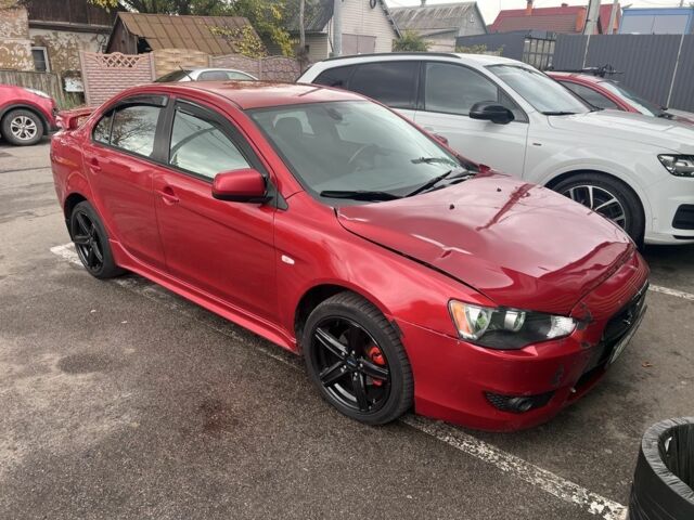 Червоний Міцубісі Lancer, об'ємом двигуна 2 л та пробігом 240 тис. км за 4900 $, фото 1 на Automoto.ua