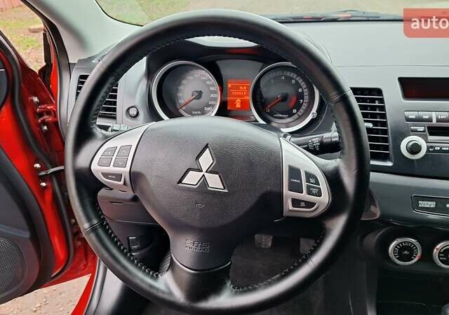 Красный Мицубиси Лансер, объемом двигателя 2 л и пробегом 120 тыс. км за 7800 $, фото 25 на Automoto.ua