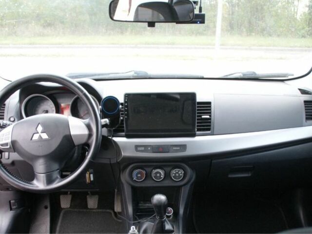 Мицубиси Лансер 2009 в Львове на Automoto.ua Красный Мицубиси Лансер, объемом двигателя 1.5 л и пробегом 202 тыс. км за 5800 $, фото 14 на Automoto.ua