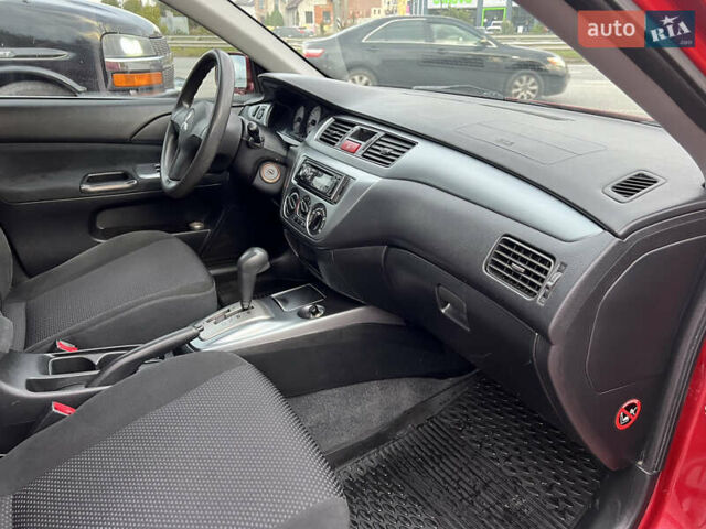 Міцубісі Lancer 2009 у Вінниці на Automoto.ua Червоний Міцубісі Lancer, об'ємом двигуна 1.58 л та пробігом 133 тис. км за 6750 $, фото 26 на Automoto.ua