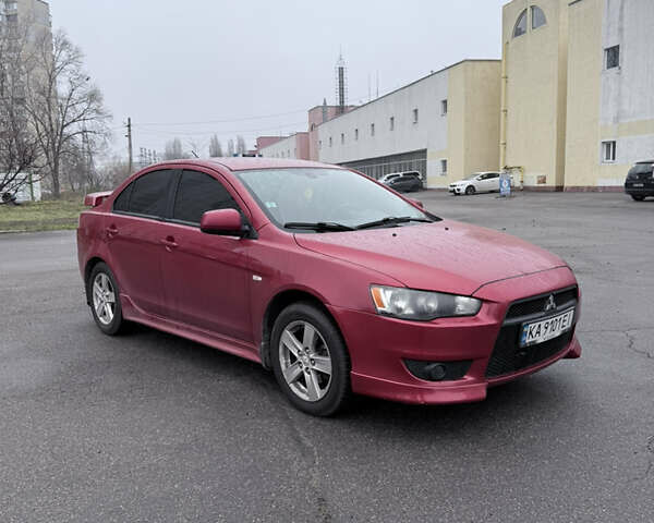 Красный Мицубиси Лансер, объемом двигателя 2 л и пробегом 170 тыс. км за 6300 $, фото 3 на Automoto.ua