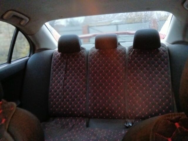 Червоний Міцубісі Lancer, об'ємом двигуна 2 л та пробігом 2 тис. км за 6200 $, фото 7 на Automoto.ua