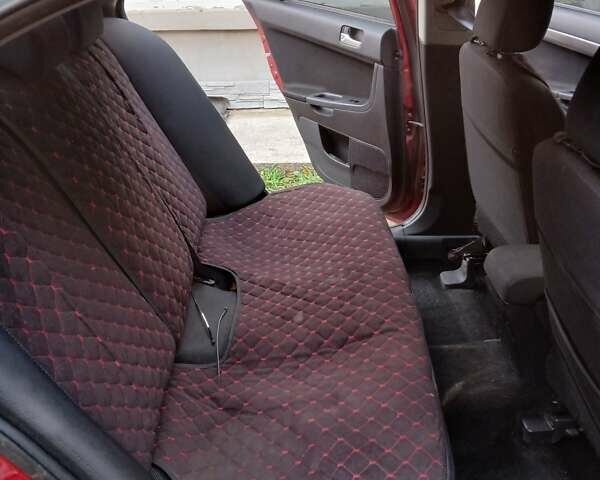 Червоний Міцубісі Lancer, об'ємом двигуна 2 л та пробігом 228 тис. км за 6200 $, фото 11 на Automoto.ua