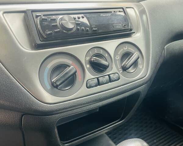 Червоний Міцубісі Lancer, об'ємом двигуна 1.58 л та пробігом 132 тис. км за 5300 $, фото 1 на Automoto.ua