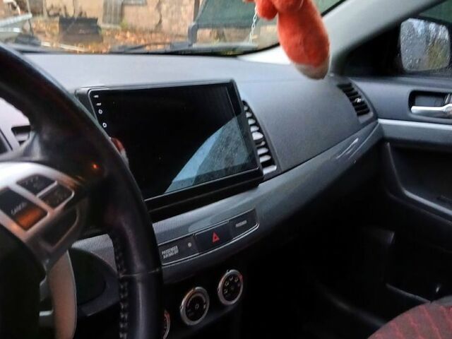 Червоний Міцубісі Lancer, об'ємом двигуна 2 л та пробігом 228 тис. км за 6500 $, фото 3 на Automoto.ua