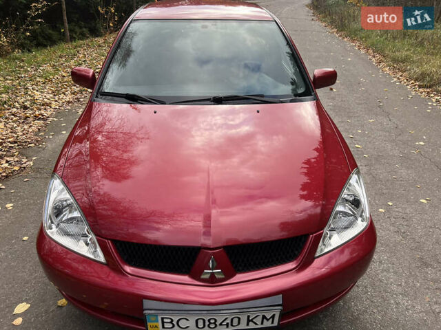 Міцубісі Lancer 2009 у Вінниці на Automoto.ua Червоний Міцубісі Lancer, об'ємом двигуна 1.58 л та пробігом 133 тис. км за 6750 $, фото 16 на Automoto.ua