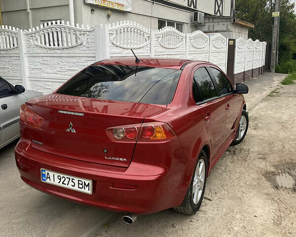 Красный Мицубиси Лансер, объемом двигателя 2 л и пробегом 225 тыс. км за 7200 $, фото 7 на Automoto.ua
