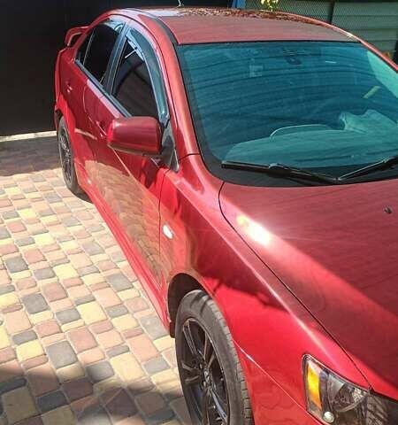 Червоний Міцубісі Lancer, об'ємом двигуна 2 л та пробігом 173 тис. км за 6900 $, фото 10 на Automoto.ua