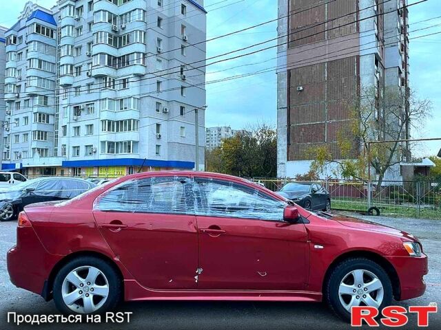 Червоний Міцубісі Lancer, об'ємом двигуна 2 л та пробігом 120 тис. км за 2999 $, фото 2 на Automoto.ua