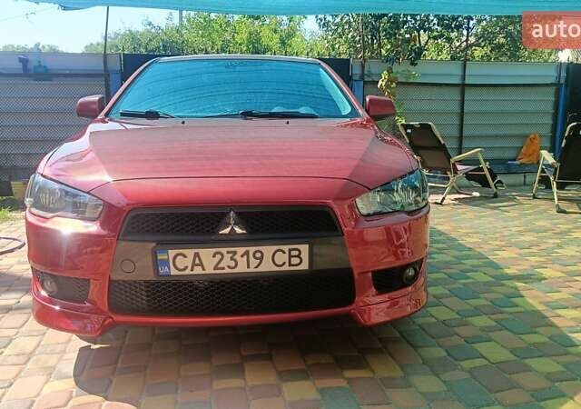 Червоний Міцубісі Lancer, об'ємом двигуна 2 л та пробігом 173 тис. км за 6900 $, фото 9 на Automoto.ua