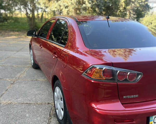 Червоний Міцубісі Lancer, об'ємом двигуна 1.5 л та пробігом 162 тис. км за 5800 $, фото 29 на Automoto.ua