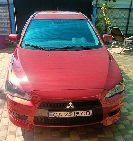 Червоний Міцубісі Lancer, об'ємом двигуна 2 л та пробігом 173 тис. км за 6900 $, фото 11 на Automoto.ua