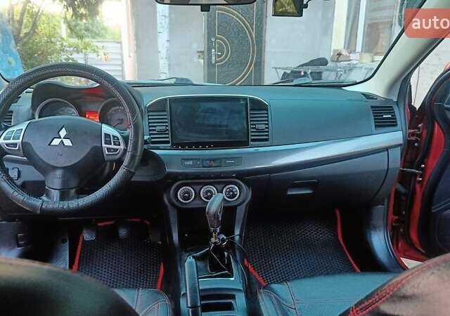 Червоний Міцубісі Lancer, об'ємом двигуна 2 л та пробігом 173 тис. км за 6900 $, фото 1 на Automoto.ua