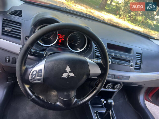 Червоний Міцубісі Lancer, об'ємом двигуна 1.5 л та пробігом 162 тис. км за 5800 $, фото 17 на Automoto.ua