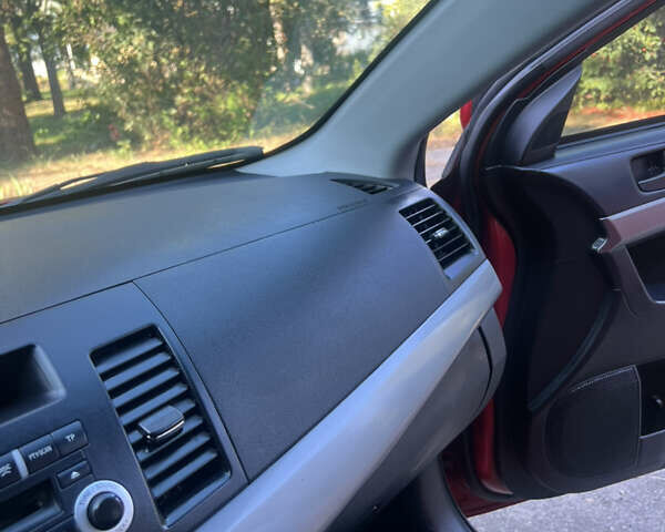 Червоний Міцубісі Lancer, об'ємом двигуна 1.5 л та пробігом 162 тис. км за 5800 $, фото 11 на Automoto.ua