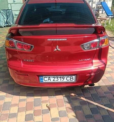 Червоний Міцубісі Lancer, об'ємом двигуна 2 л та пробігом 173 тис. км за 6900 $, фото 12 на Automoto.ua