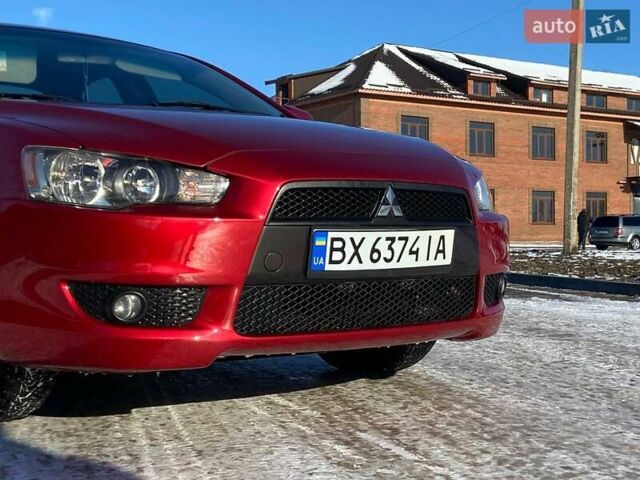 Червоний Міцубісі Lancer, об'ємом двигуна 2 л та пробігом 218 тис. км за 5955 $, фото 5 на Automoto.ua