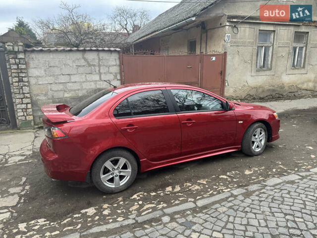 Червоний Міцубісі Lancer, об'ємом двигуна 2 л та пробігом 226 тис. км за 7500 $, фото 1 на Automoto.ua