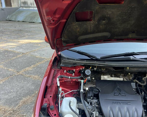 Червоний Міцубісі Lancer, об'ємом двигуна 1.5 л та пробігом 162 тис. км за 5800 $, фото 3 на Automoto.ua