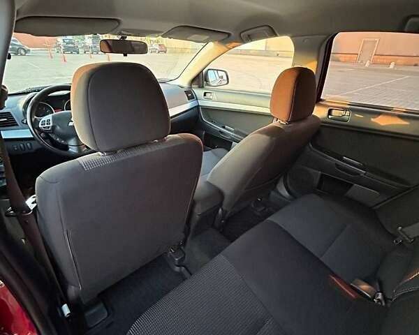 Красный Мицубиси Лансер, объемом двигателя 1.5 л и пробегом 81 тыс. км за 8800 $, фото 7 на Automoto.ua