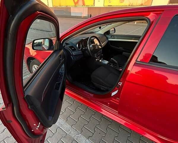 Красный Мицубиси Лансер, объемом двигателя 1.5 л и пробегом 81 тыс. км за 8800 $, фото 2 на Automoto.ua
