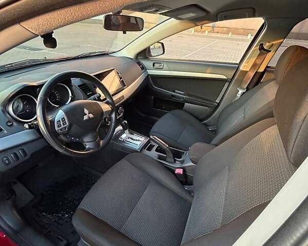 Красный Мицубиси Лансер, объемом двигателя 1.5 л и пробегом 81 тыс. км за 8800 $, фото 3 на Automoto.ua