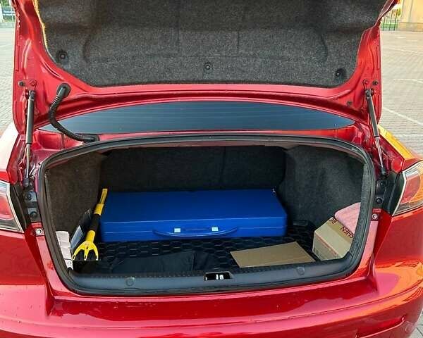 Красный Мицубиси Лансер, объемом двигателя 1.5 л и пробегом 81 тыс. км за 8800 $, фото 9 на Automoto.ua