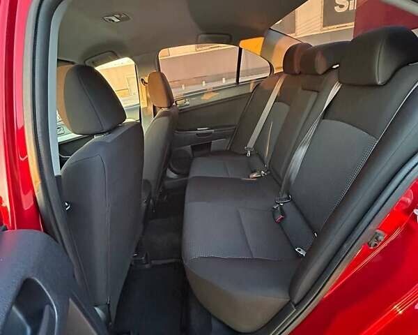 Красный Мицубиси Лансер, объемом двигателя 1.5 л и пробегом 81 тыс. км за 8800 $, фото 8 на Automoto.ua