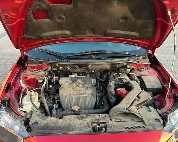 Красный Мицубиси Лансер, объемом двигателя 1.5 л и пробегом 81 тыс. км за 8800 $, фото 5 на Automoto.ua