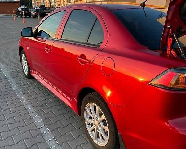 Красный Мицубиси Лансер, объемом двигателя 1.5 л и пробегом 81 тыс. км за 8800 $, фото 1 на Automoto.ua