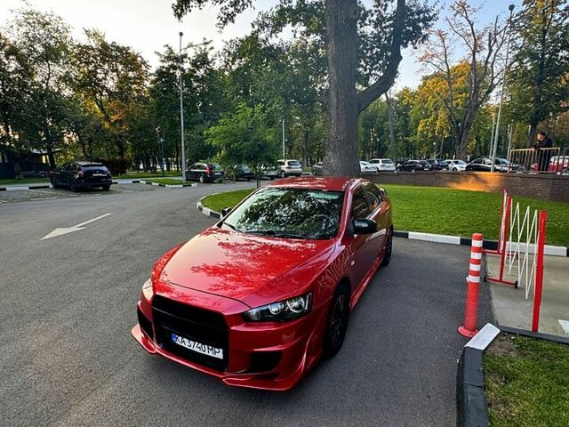 Красный Мицубиси Лансер, объемом двигателя 2 л и пробегом 260 тыс. км за 7300 $, фото 7 на Automoto.ua