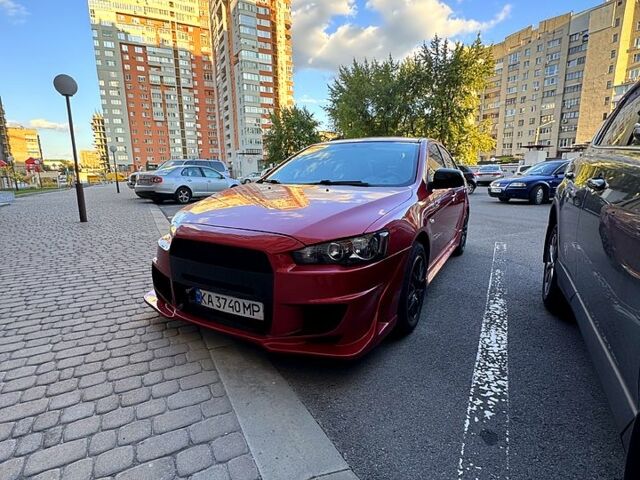 Мицубиси Лансер 2012 в Харькове на Automoto.ua Красный Мицубиси Лансер, объемом двигателя 2 л и пробегом 260 тыс. км за 6900 $, фото 7 на Automoto.ua
